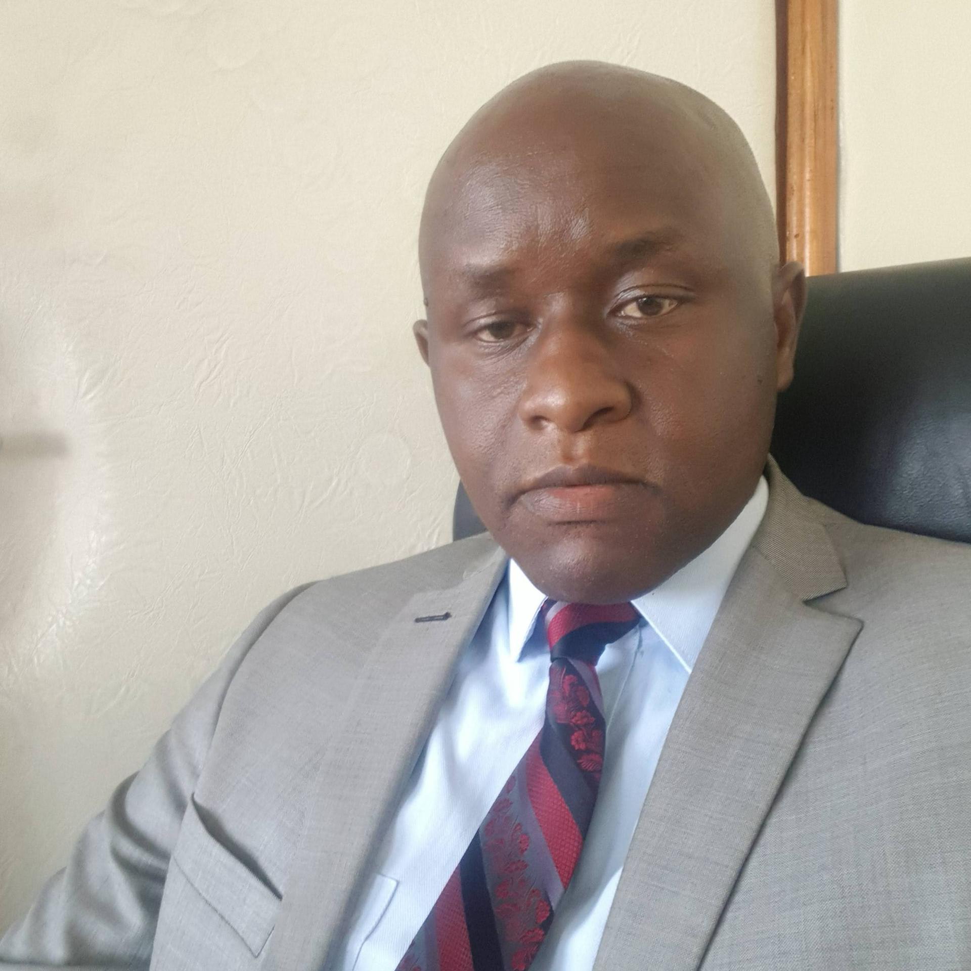 PETER C. LANGAT