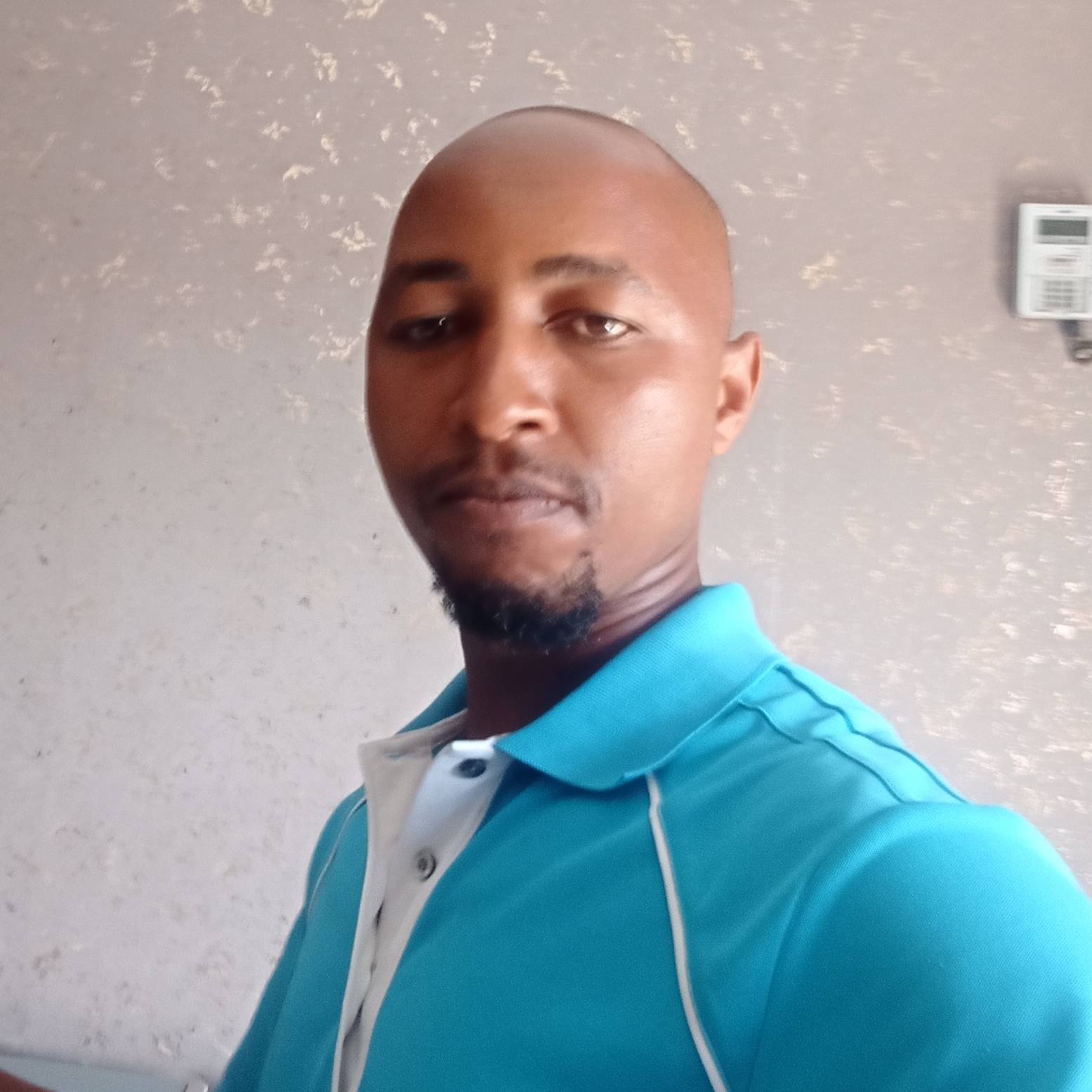 MARTIN WANJUGU